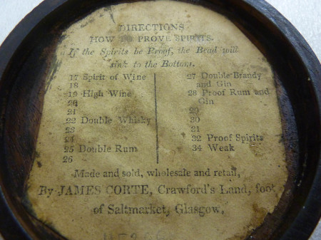 Detail of label inside the lid of Philosophical Bubbles for gauging density of liquids